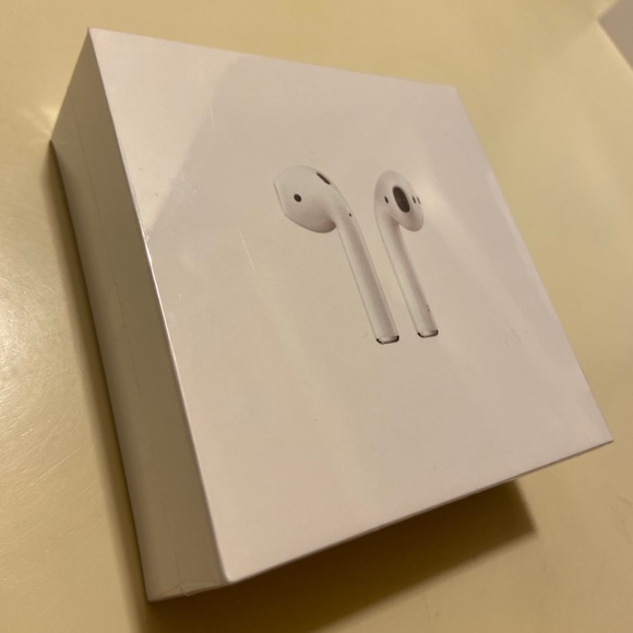 BRAND NEW AIRPODS WITH CHARGING CASE - Picture 1 of 2